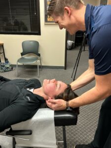 chiropractic neck adjustment by Dr. Brandon Pounds