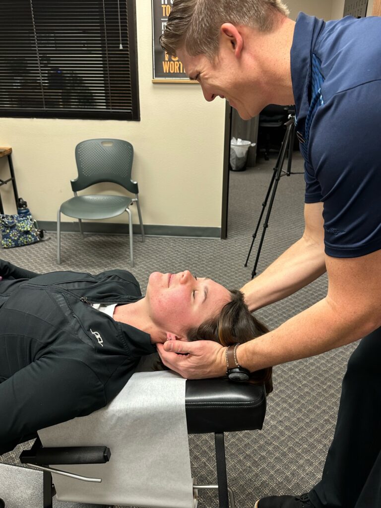 chiropractic neck adjustment by Dr. Brandon Pounds