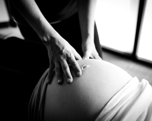 a picture of a pregnant women receiving webster technique