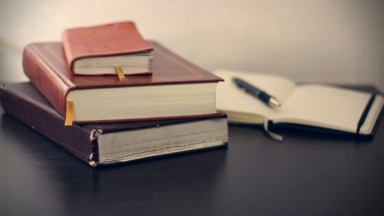 a stack of professional books